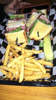 Club sandwich with fries