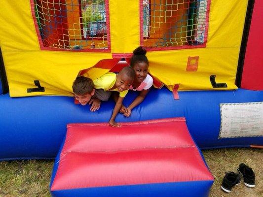 Community BBQ and bounce house.