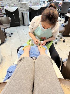 Lisa doing my pedicure at the pedicure station