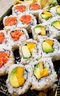 Spicy Tuna Roll + Mango Avocado Roll. (2 rolls for $7.99 lunch special.) gewd!