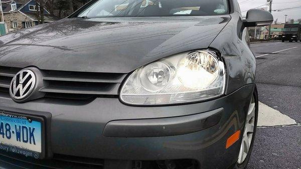 Damaged light cluster and front fender