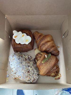 Dreamsicle Danish, croissant, almond croissant and a ham and cheese croissant