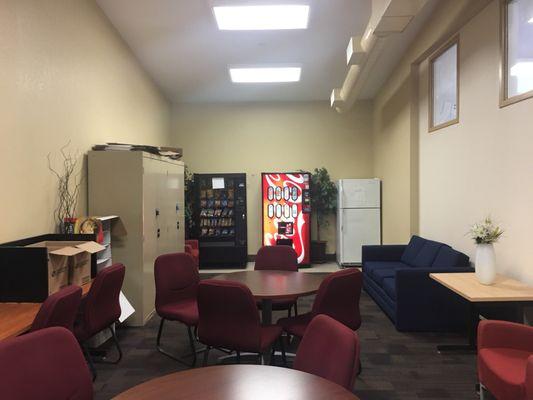 Vending machine, shared fridge, couple of boxes of free food.