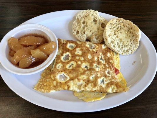 Veggie omelette with English muffin, and cooked apples.