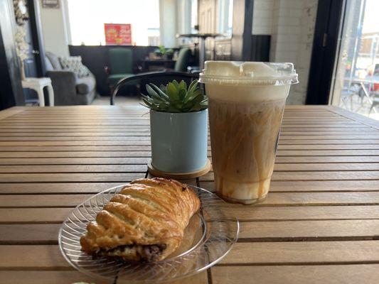 Iced caramel macchiato and chocolate croissant