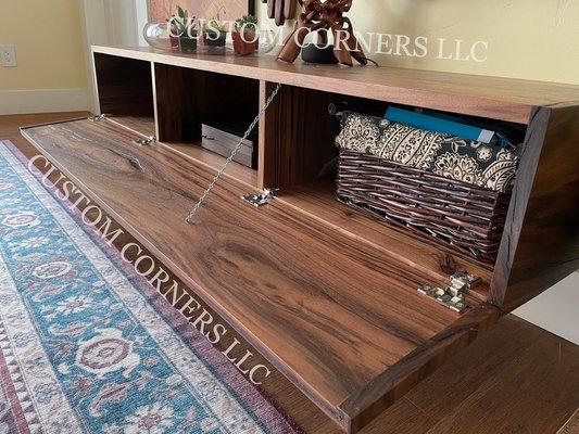 Hidden storage entertainment center