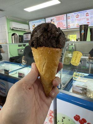 Dark chocolate raspberry truffle in a pretzel cone