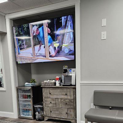 The TV and beverage center.