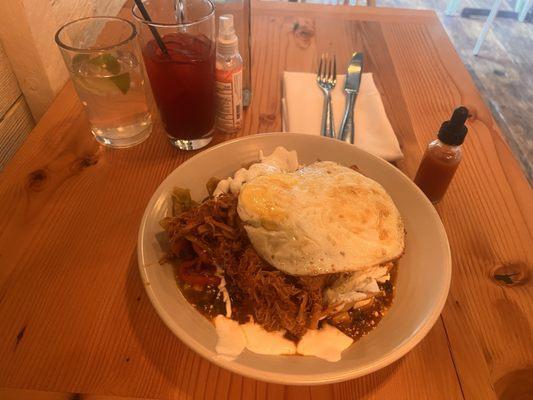 Chilaquiles- Christmas style with braised chicken .