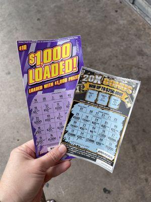 Cashing in my two $50 winning scratchers. I've never won this much on a scratcher. So exciting!!