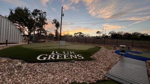 Practice green during sunset