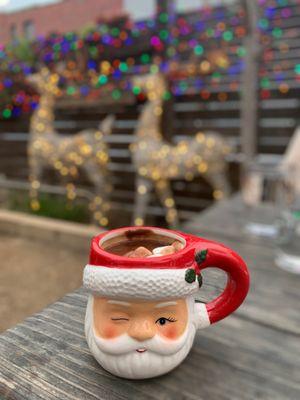 Holiday adult sipping hot chocolate