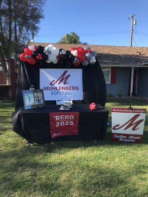 Alex and her team made the backdrop banner, the table flag and name card.