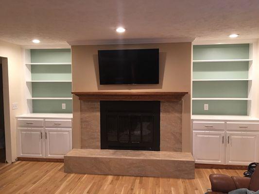 Bookcase and Fireplace removal. Removed old fake stone from fireplace and new door and drawer fronts.