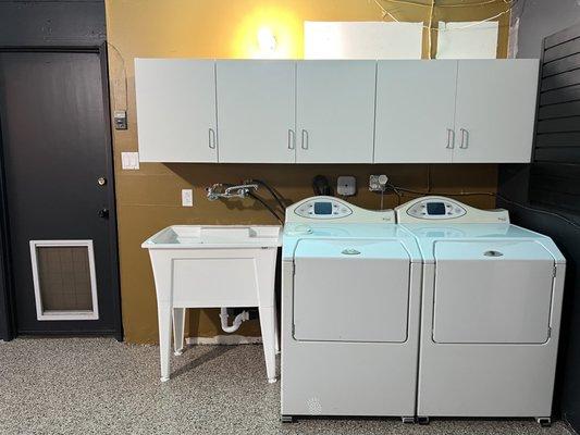 Over laundry cabinets!