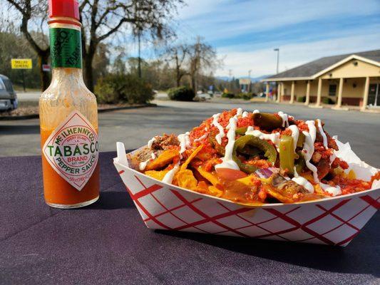 Devon's Dirty Nachos, a plate full of wow