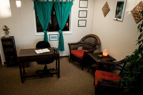 This lovely waiting room is comfortable and has coffee/tea available!