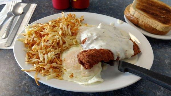 Denoyer Special, chicken fried chicken with eggs, potatoes, and toast.