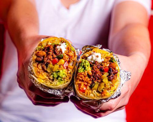 Clocking in at 1.5lbs, get ready to treat yourself with our new signature Loaded Burrito! It's filled to the brim with ooey gooey goodness!