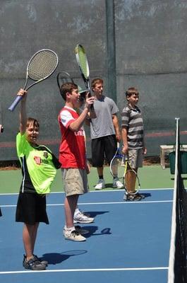 Our Tennis Camp produced some outstanding imitations of the statue of liberty