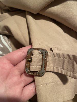 damaged jacket buckle- paint stripped off