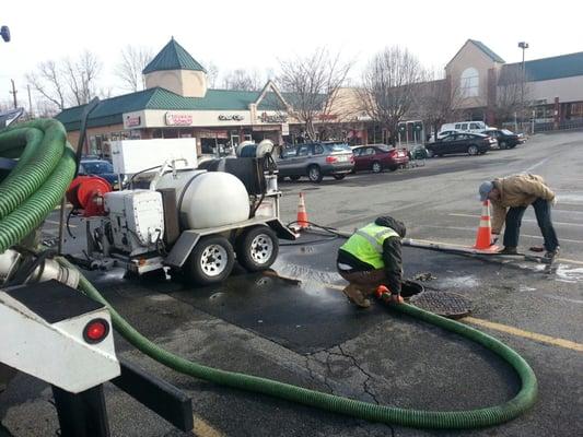 Jet rodding sanitary sewers & removing debris with pump truck at Waldbaum's in Pleasant Plains, Staten Island, New York.