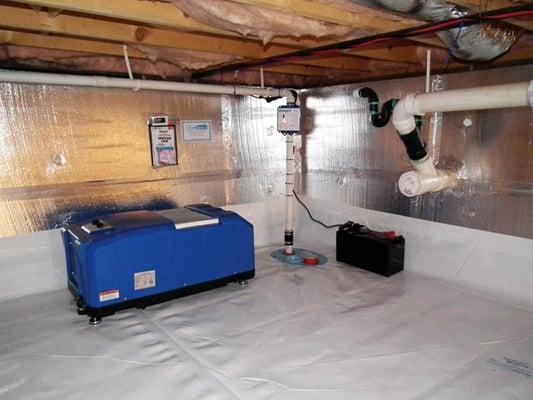 Dehumidifier and sump pump installation.