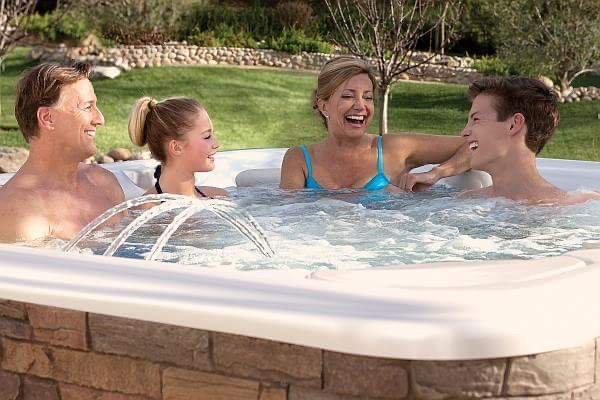 In seeing this family enjoying your beautiful spa and relaxing and having good family time don't you want to go and join them