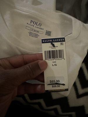 Shows original price and the mark up price for this t-shirt.