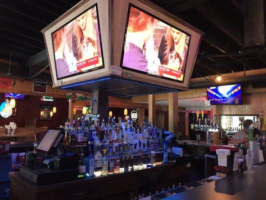 Great place to catch a game! Social oriented four sided bar