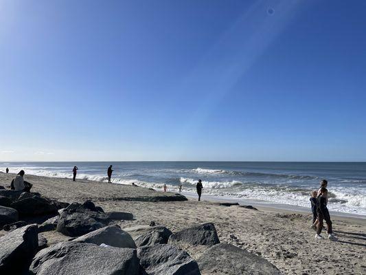 Couple young boys played on the beach in January