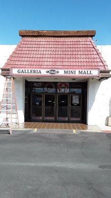 We are just inside of the Galleria Mini Mall on the right.