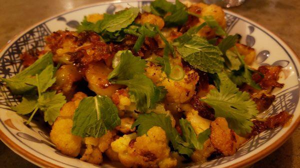 Balinese cauliflower ($14.50), vegan by default. Fine. Oily. Weird coconut sauce below it all.