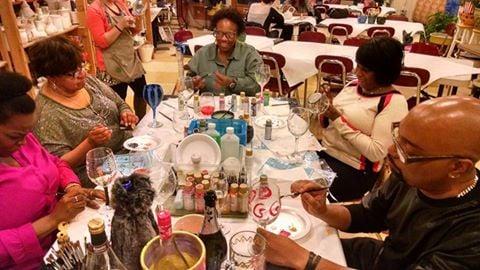 Marcy & her gang painting wine glasses and enjoying the wine!