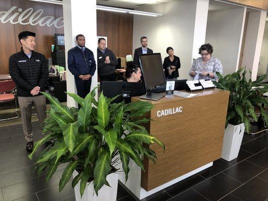 All-staff meeting at the dealership in Beachwood, Ohio.