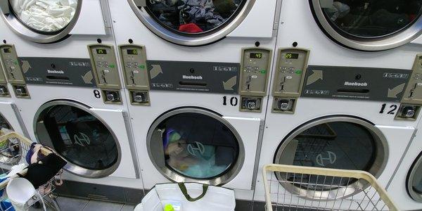 Dryers are decently large, standard rates you see at most laundromats ($0.25 = 6 mins)