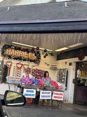 Picking up 5 leis for grandson's Grandparents Tea.