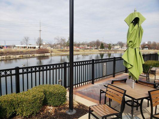 Outdoor patio with lake & geese