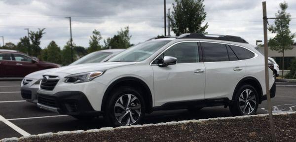 Our new 2022 Subaru Outback Touring.  Her name is "Pearl".