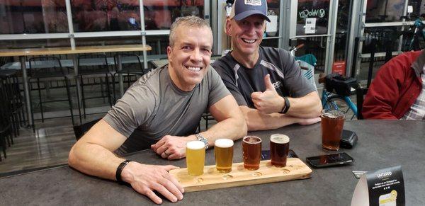 Enjoying a great tasting flight of beer at the HandleBar after an indoor cycling workout at VéloCity.