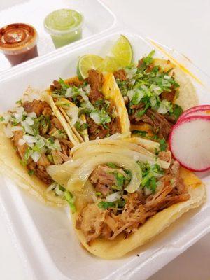 2 birria tacos and 2 carnitas tacos