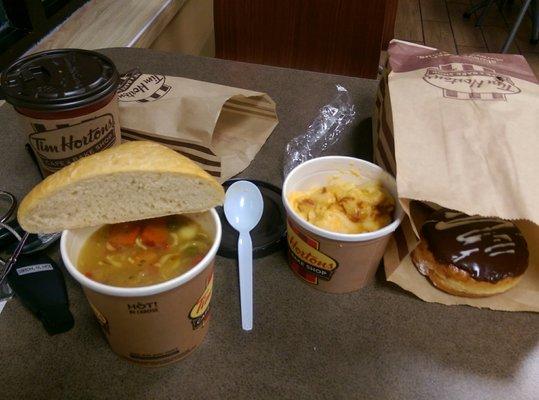 Dinner. Chicken noodle soup with bread, Mac n cheese,  coffee for morning, donut. My first Tim Horton's this trip.