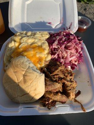 Pulled pork sandwich combo. Amazing Mac and cheese. Slaw