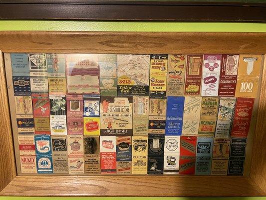 Cool mural of old matchbooks in the hall.