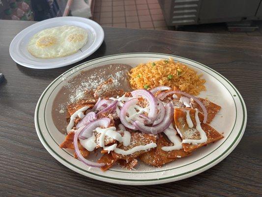 BEST CHILAQUILES with eggs on the side! Rice and beans were delicious too! GREAT FLAVORS!