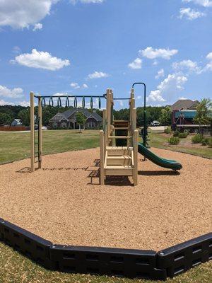 Beautiful IPEMA certified playground mulch installed at newly constructed playground.