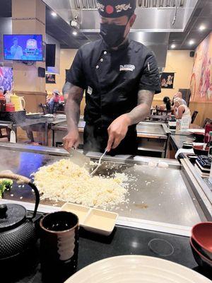 The chef preparing our meal at one of the hibachi tables.