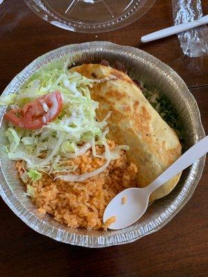 Chicken quesadilla plate. Best quesadilla I've ever had, delicious rice, and a side salad with actual flavor.