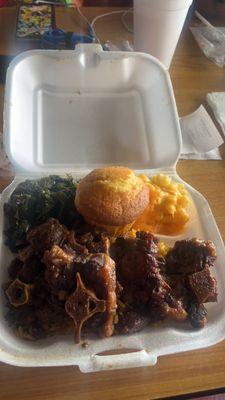 Oxtails collard greens, baked macaroni and cheese, corn bread