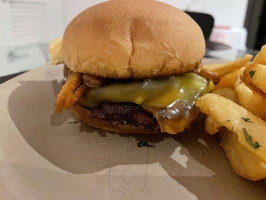 The plant based cheddar, and crispy onion petals and mushroom bacon on full display